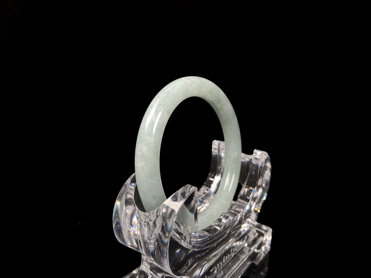 A dewy green jadeite bangle.