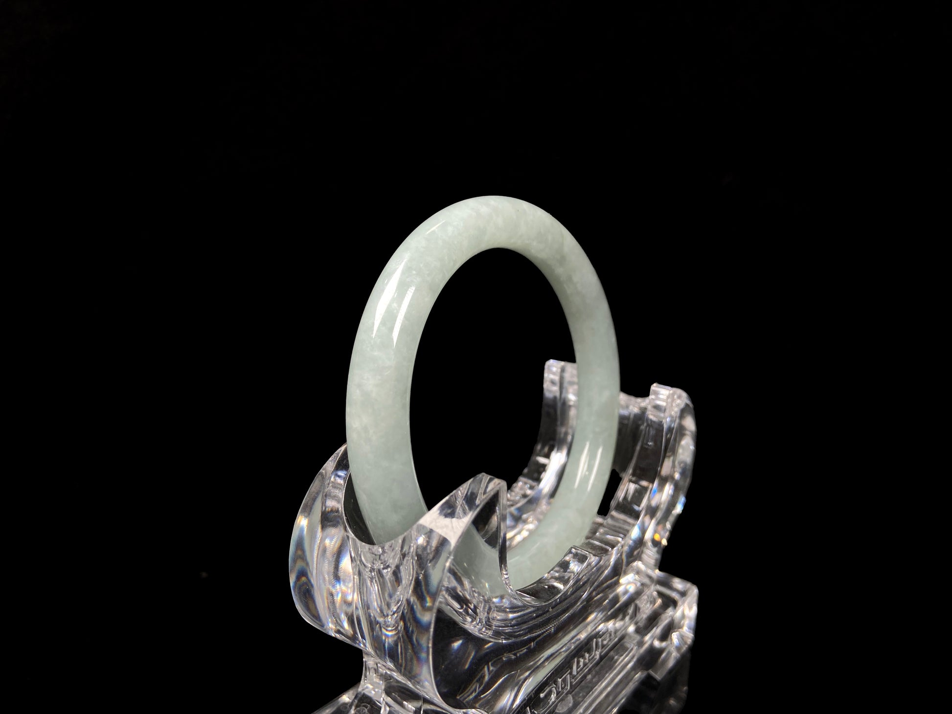 A dewy green jadeite bangle.