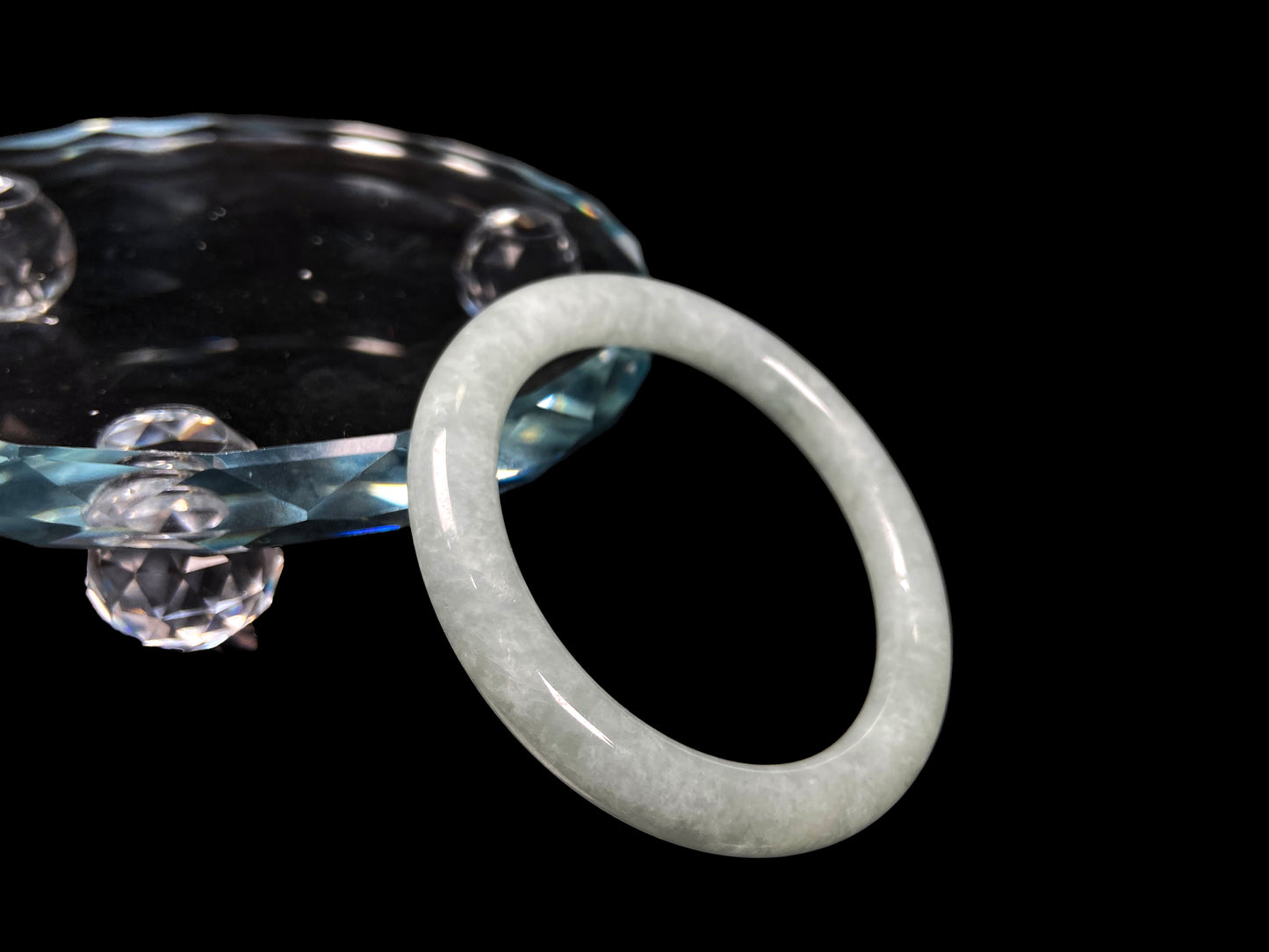 A dewy green jadeite bangle.