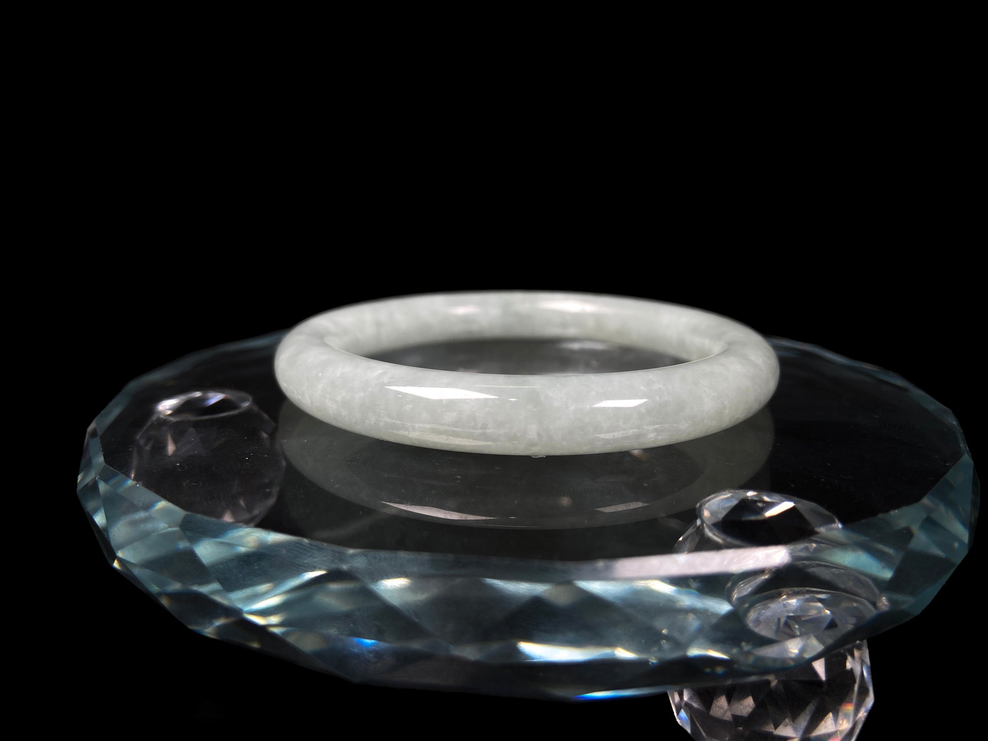 A dewy green jadeite bangle.