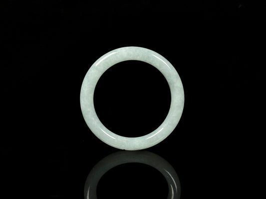 A dewy green jadeite bangle.