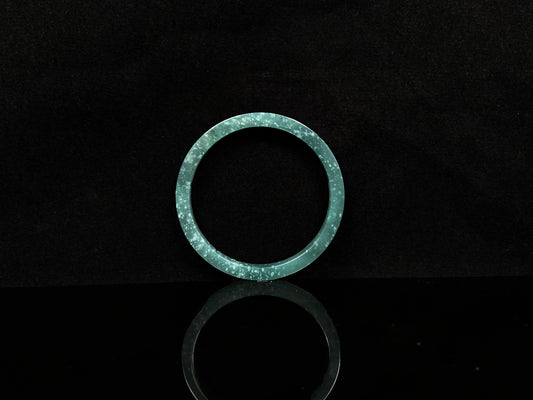 A frosted cyan sparkle jadeite bangle.
