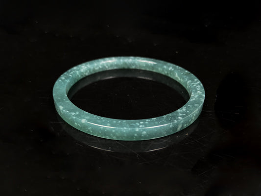 A frosted cyan sparkle jadeite bangle.