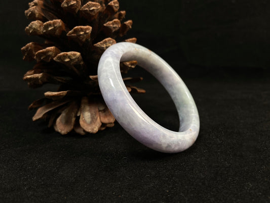 Pale purple jade gracefully mingled with white.