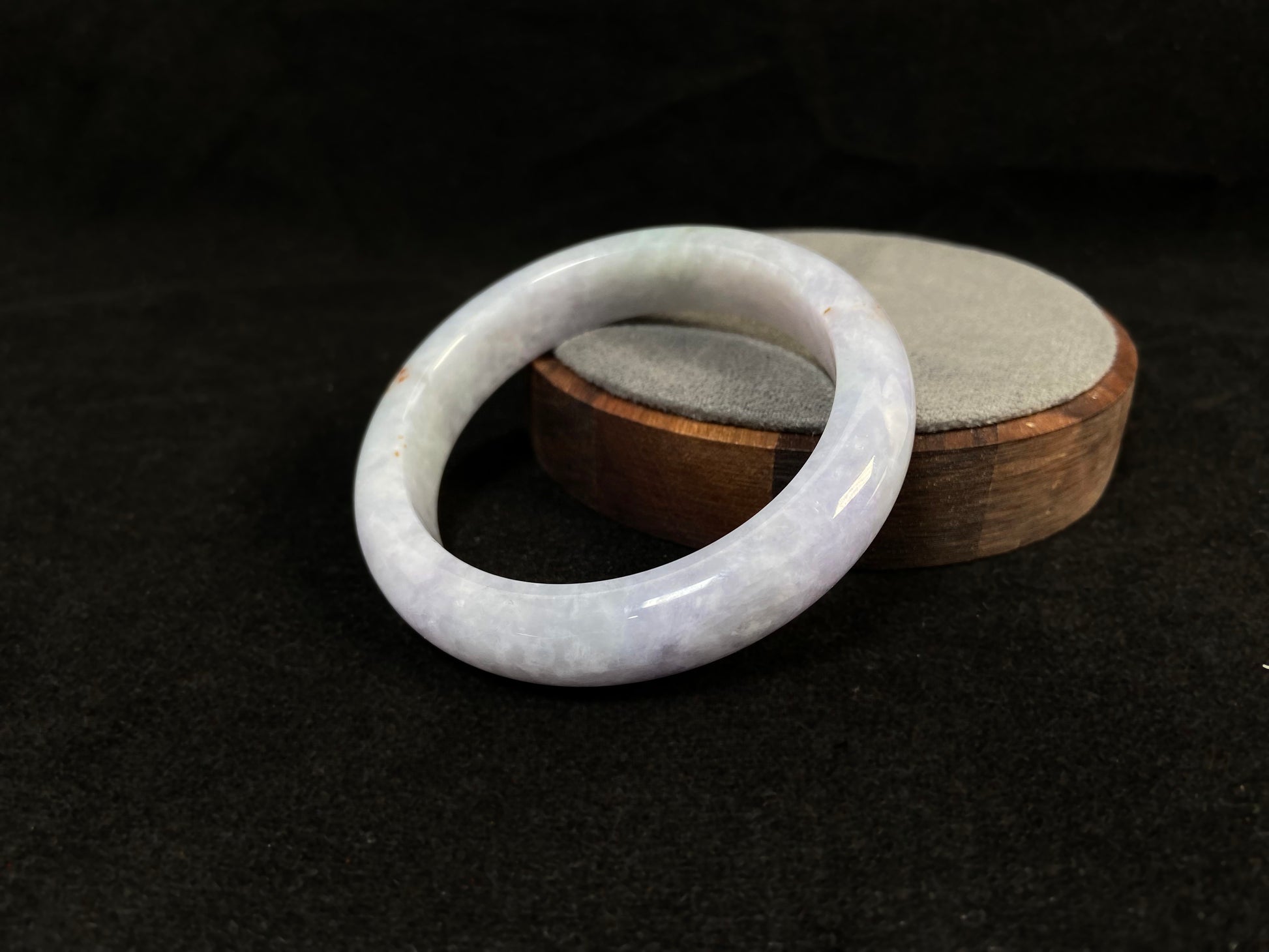 Pale purple jade gracefully mingled with white.