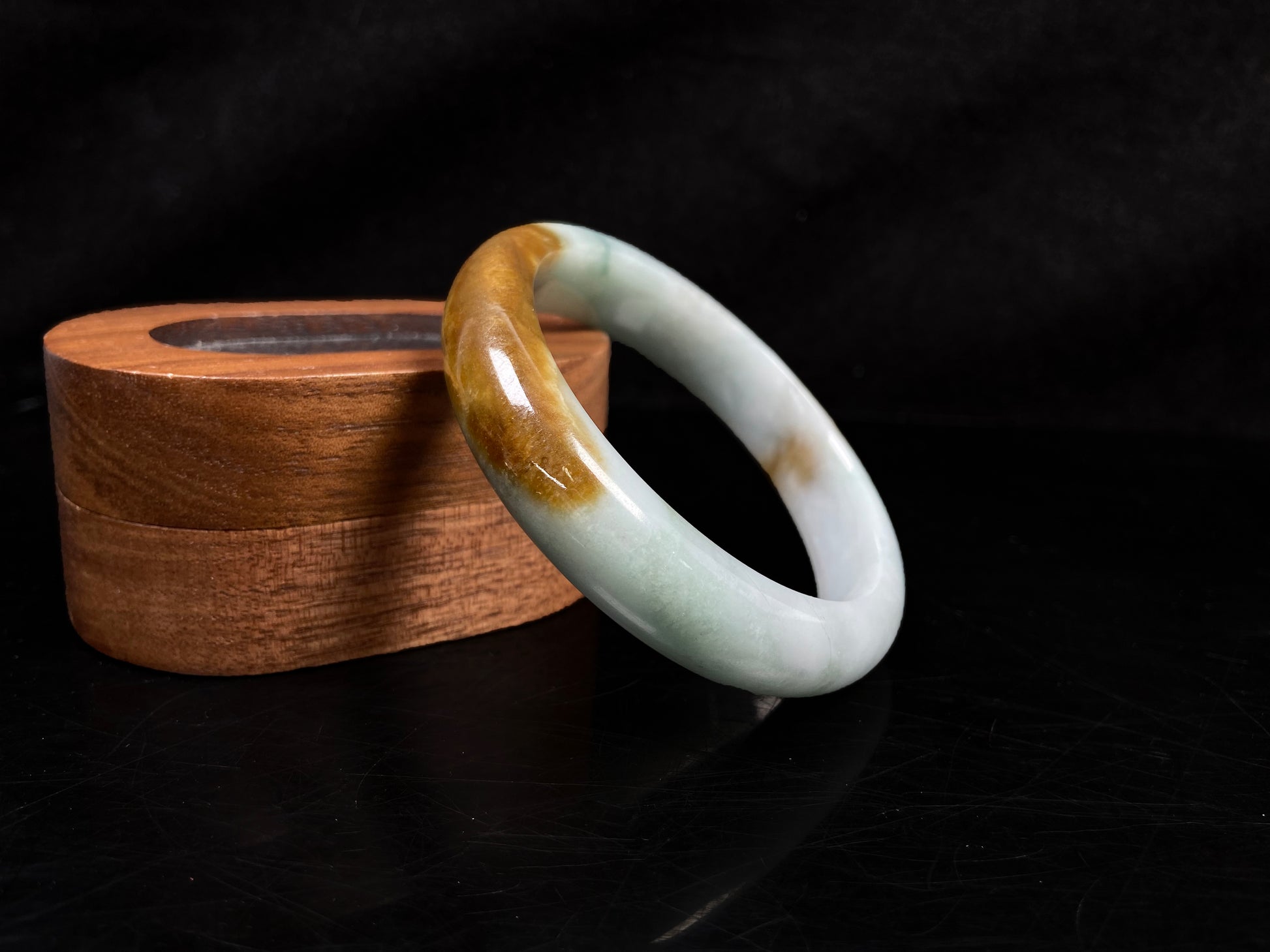 A sunset caramel jadeite bangle.