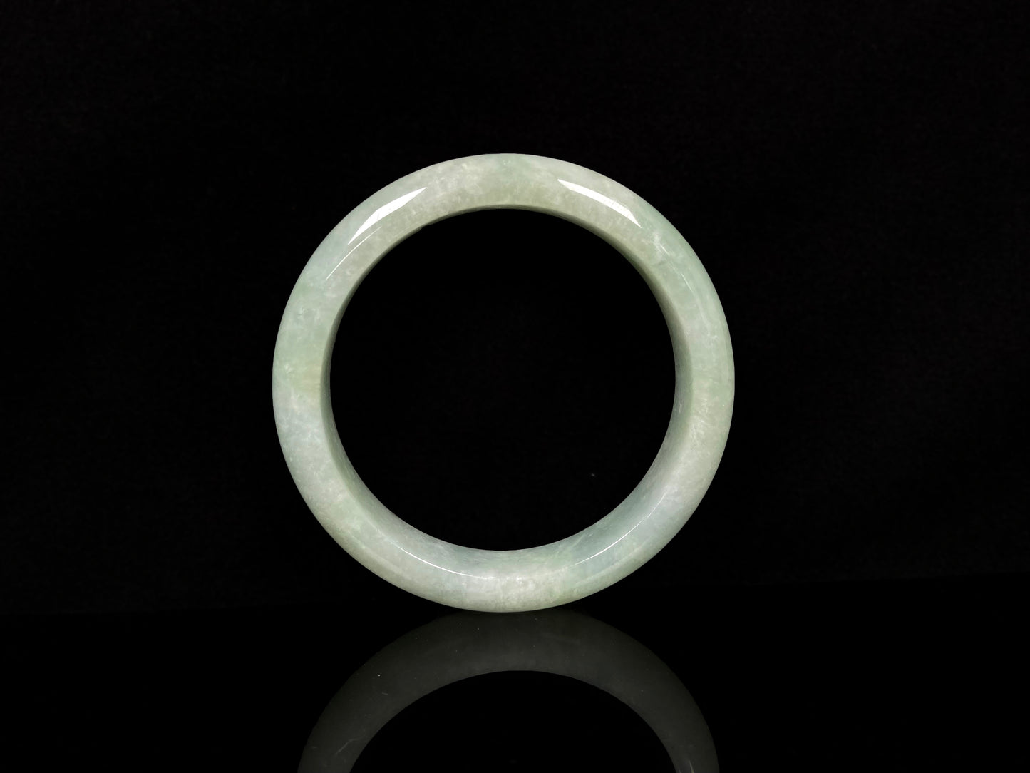 A willow bud green glow jadeite bangle.
