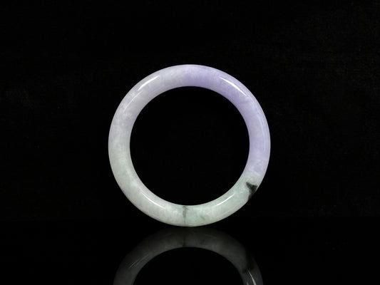A half lavender half pale green jadeite bangle.