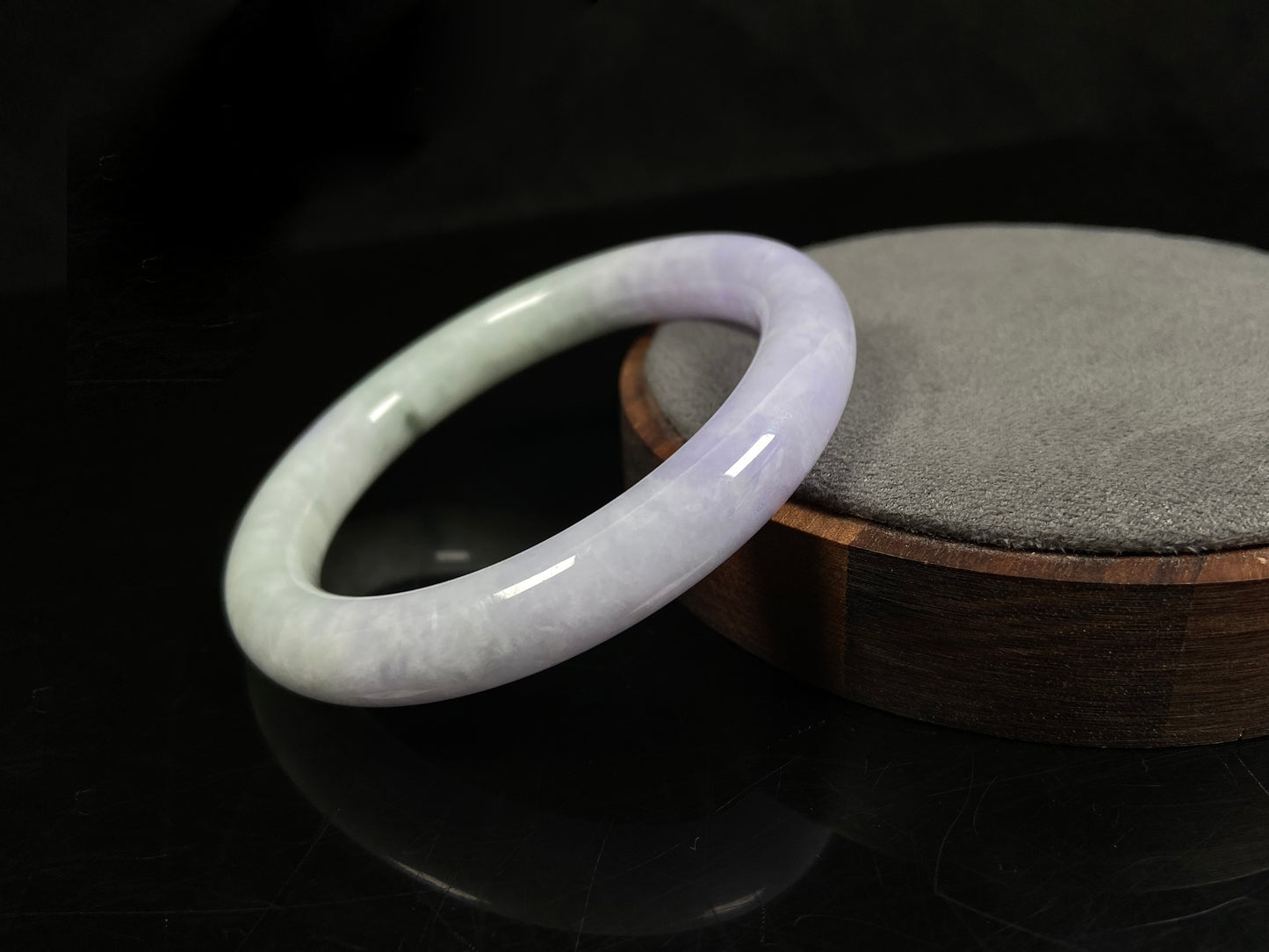 A half lavender half pale green jadeite bangle.