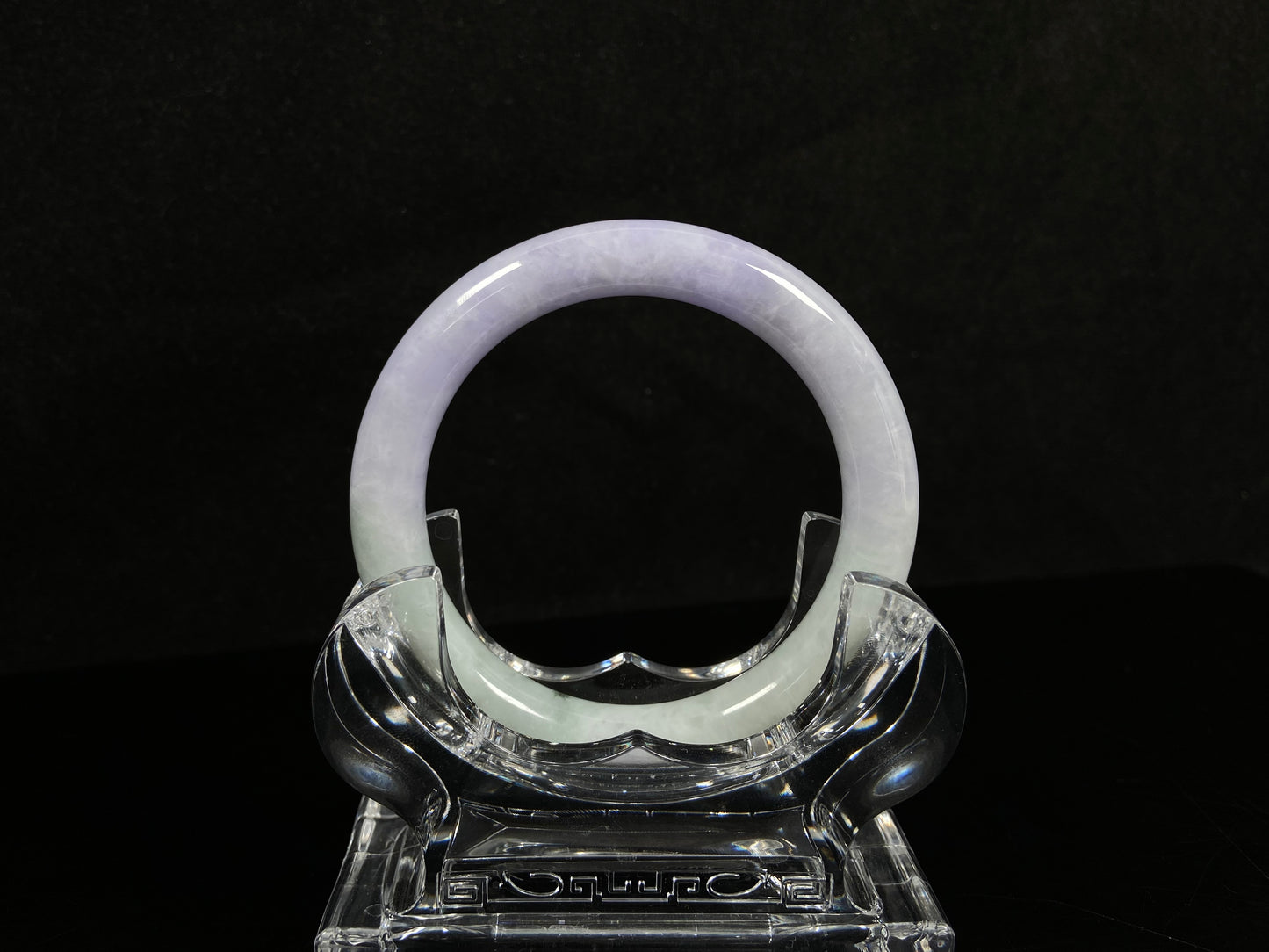 A half lavender half pale green jadeite bangle.