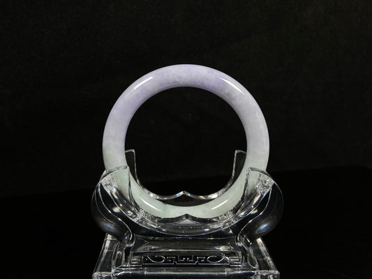 A half lavender half pale green jadeite bangle.