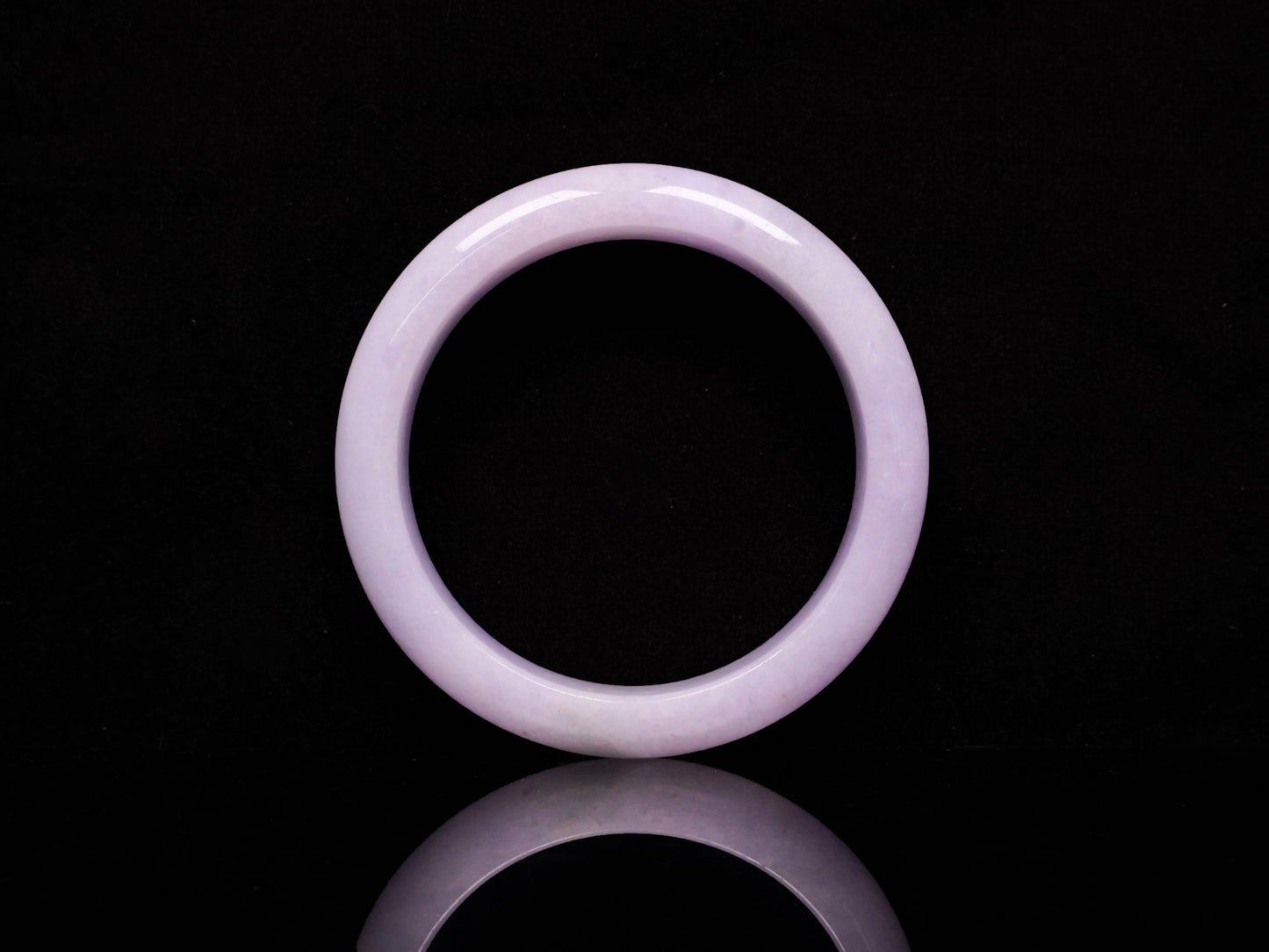 Lavender hues spreading jadeite bangle.