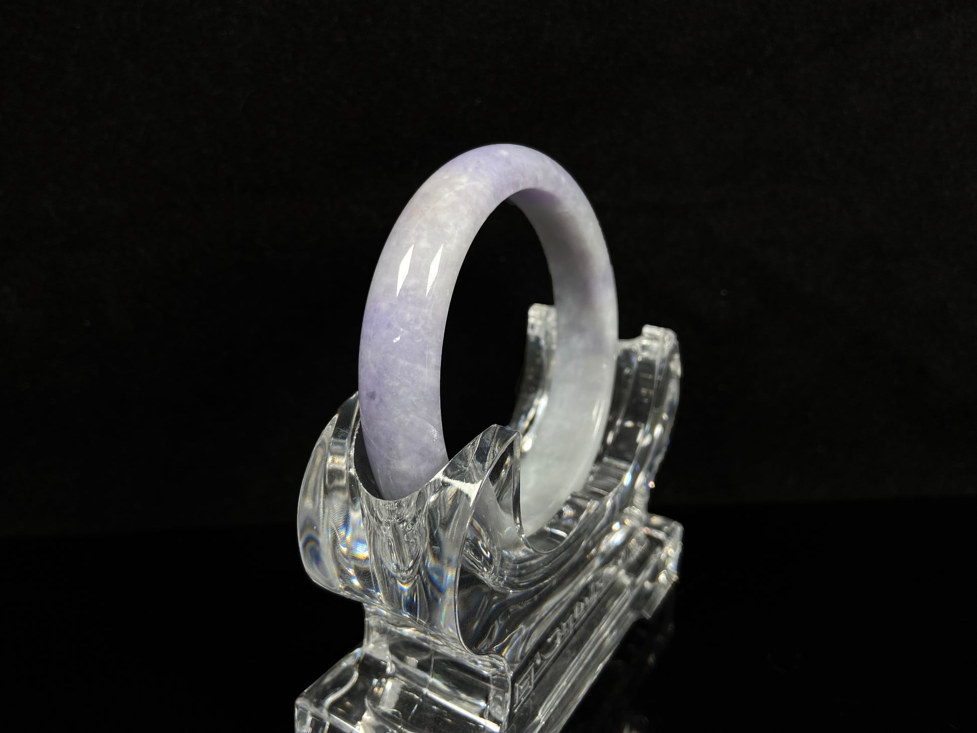 A lilac haze white jadeite bangle.