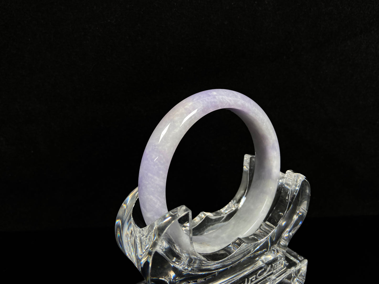 A lilac haze white jadeite bangle.