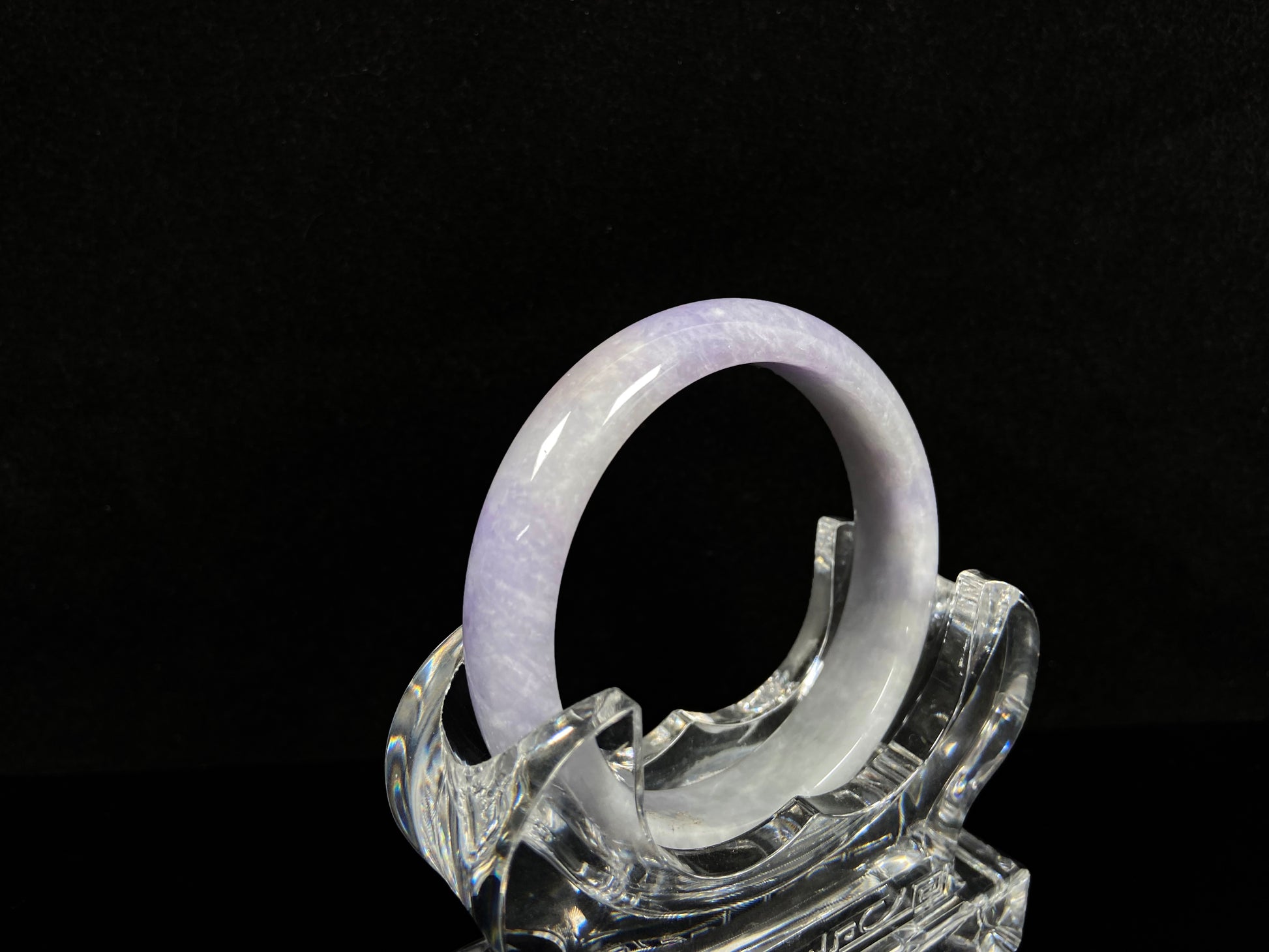 A lilac haze white jadeite bangle.