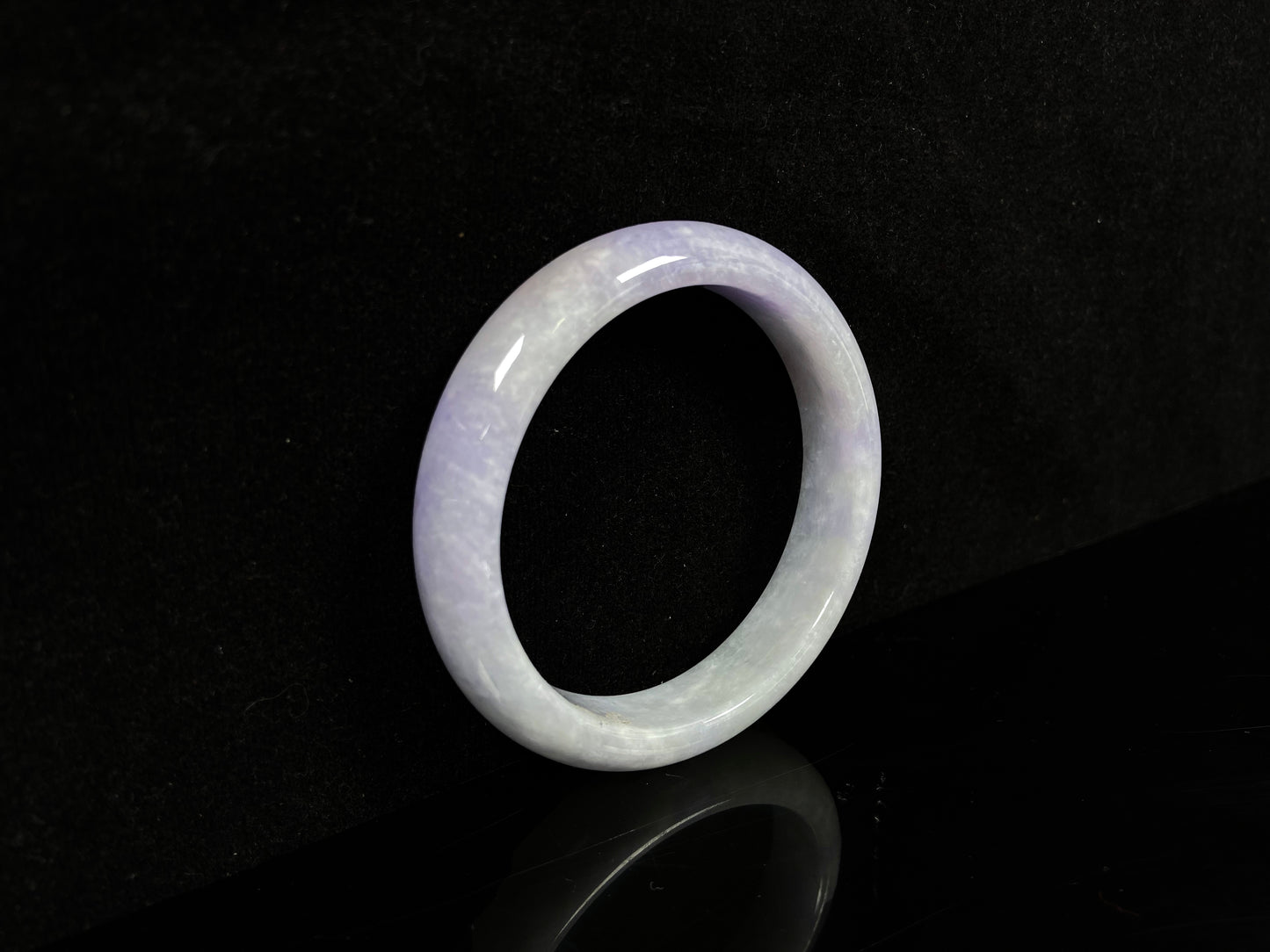 A lilac haze white jadeite bangle.