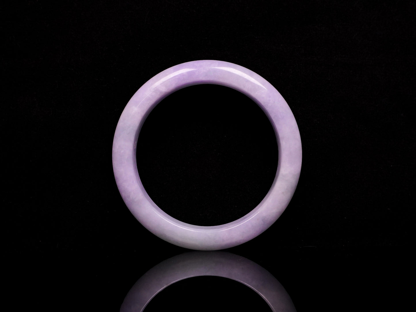 Lavender hues spreading jadeite bangle.