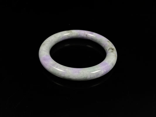 A intermingled green and lavender purple jadeite bangle.