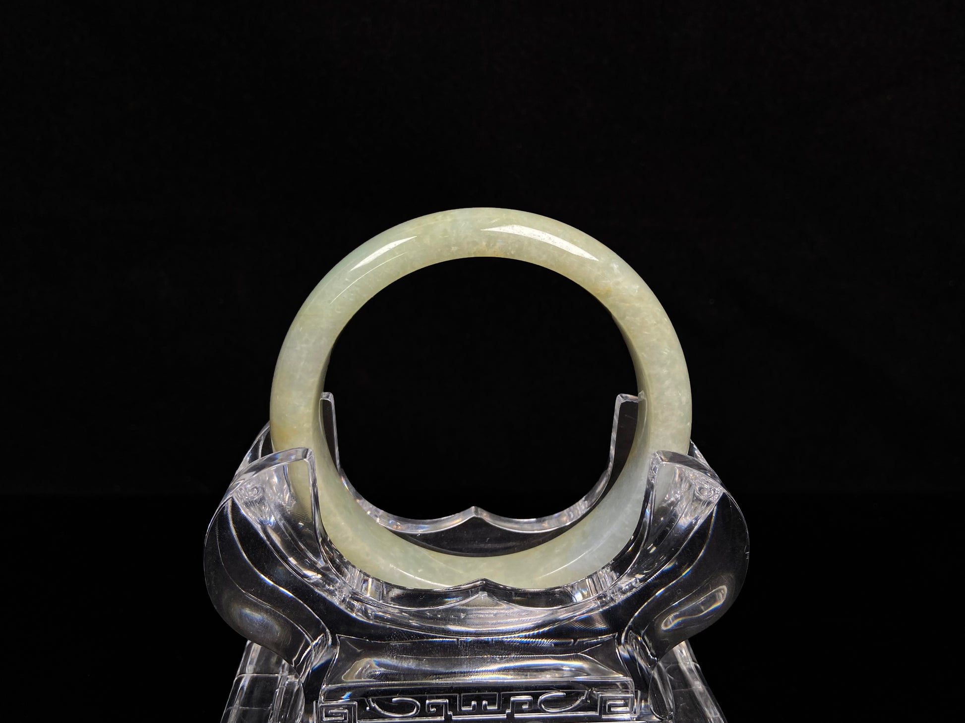 A golden glow spill jadeite bangle.