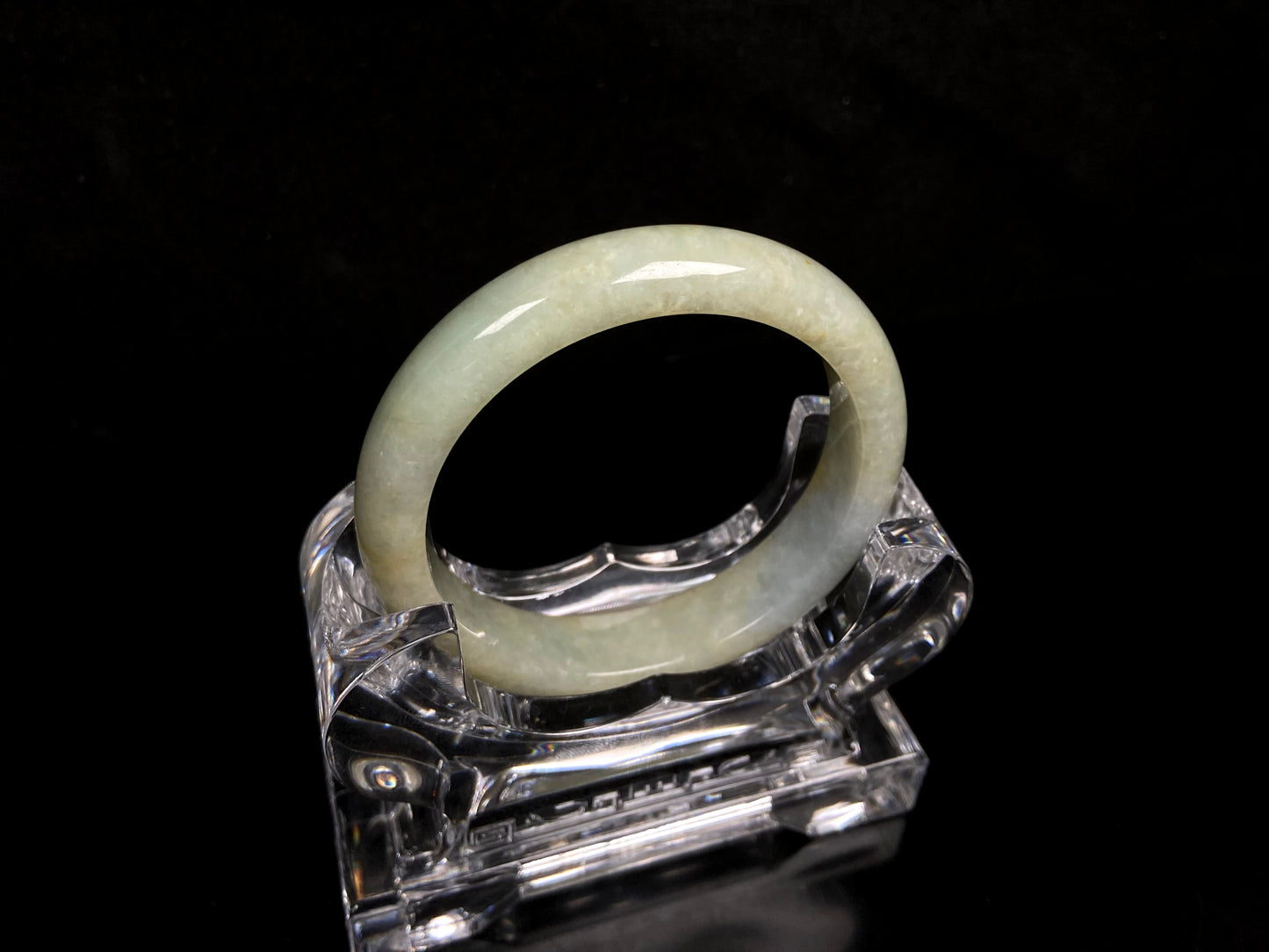 A golden glow spill jadeite bangle.
