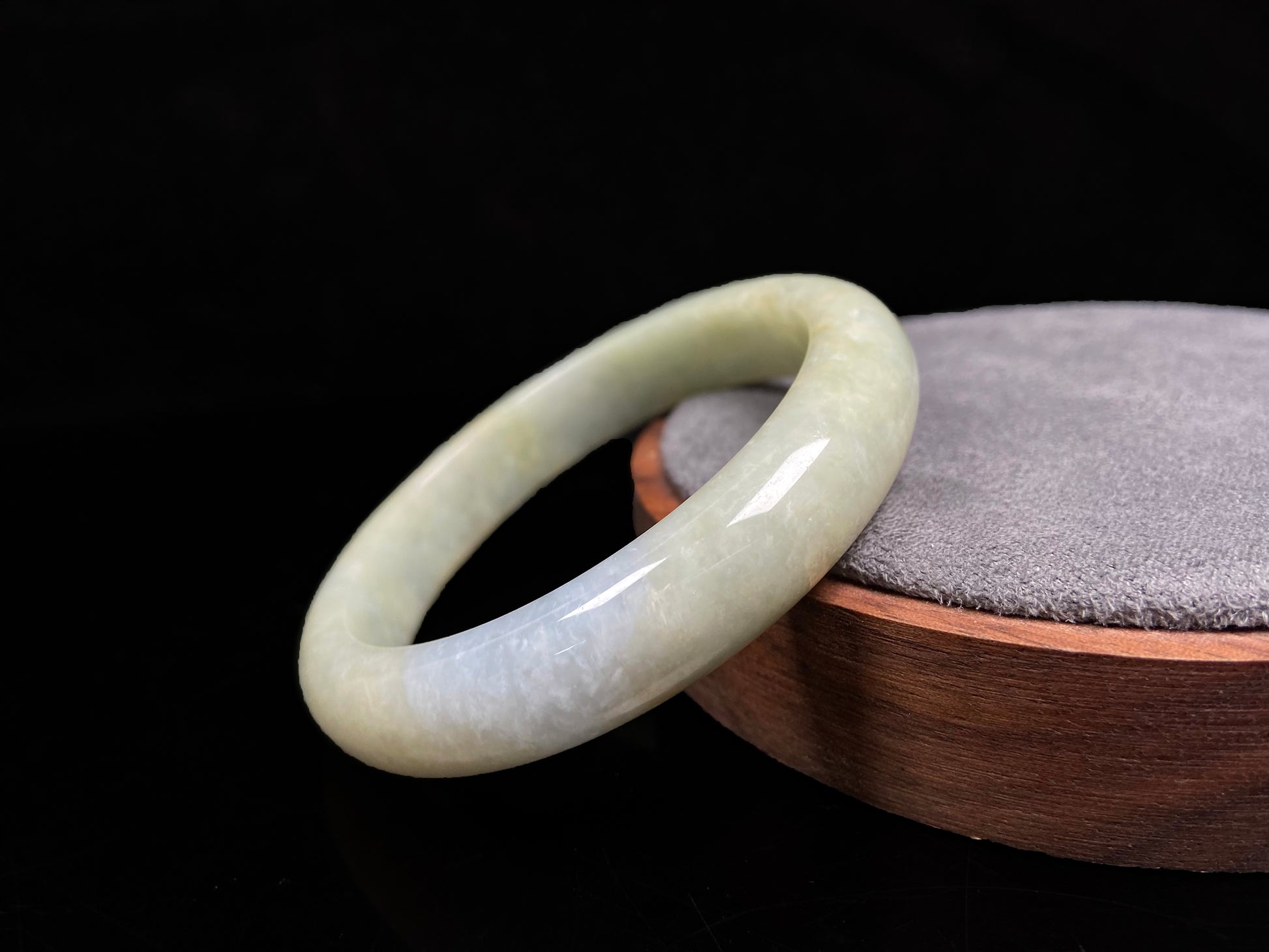 A golden glow spill jadeite bangle.