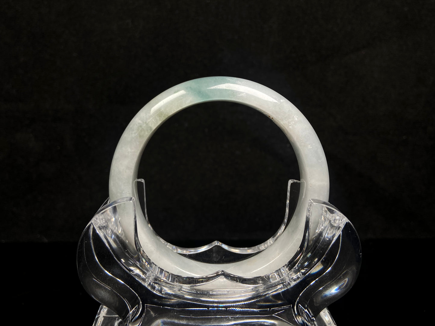 A pale mist azure jadeite bangle.