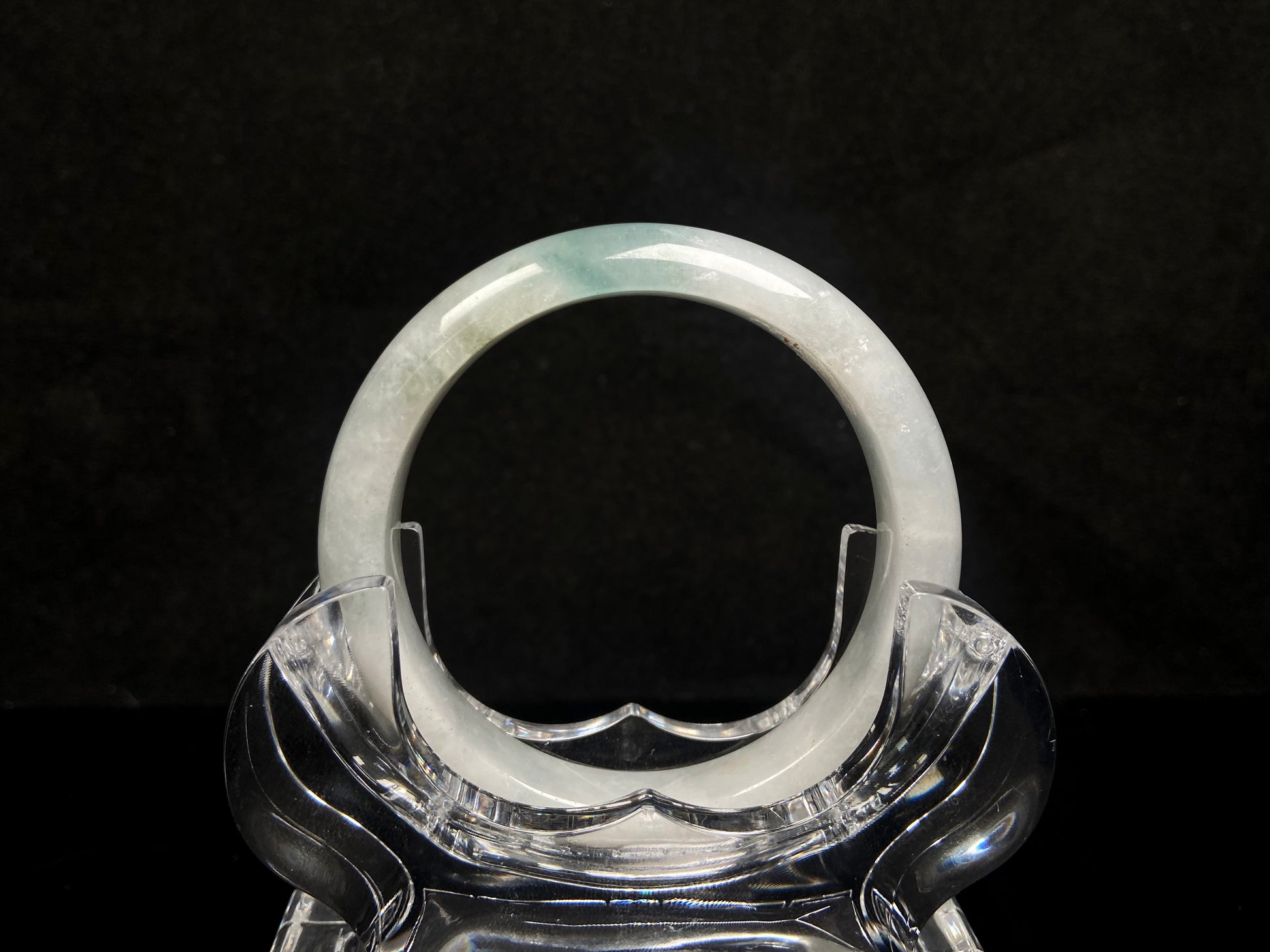 A pale mist azure jadeite bangle.