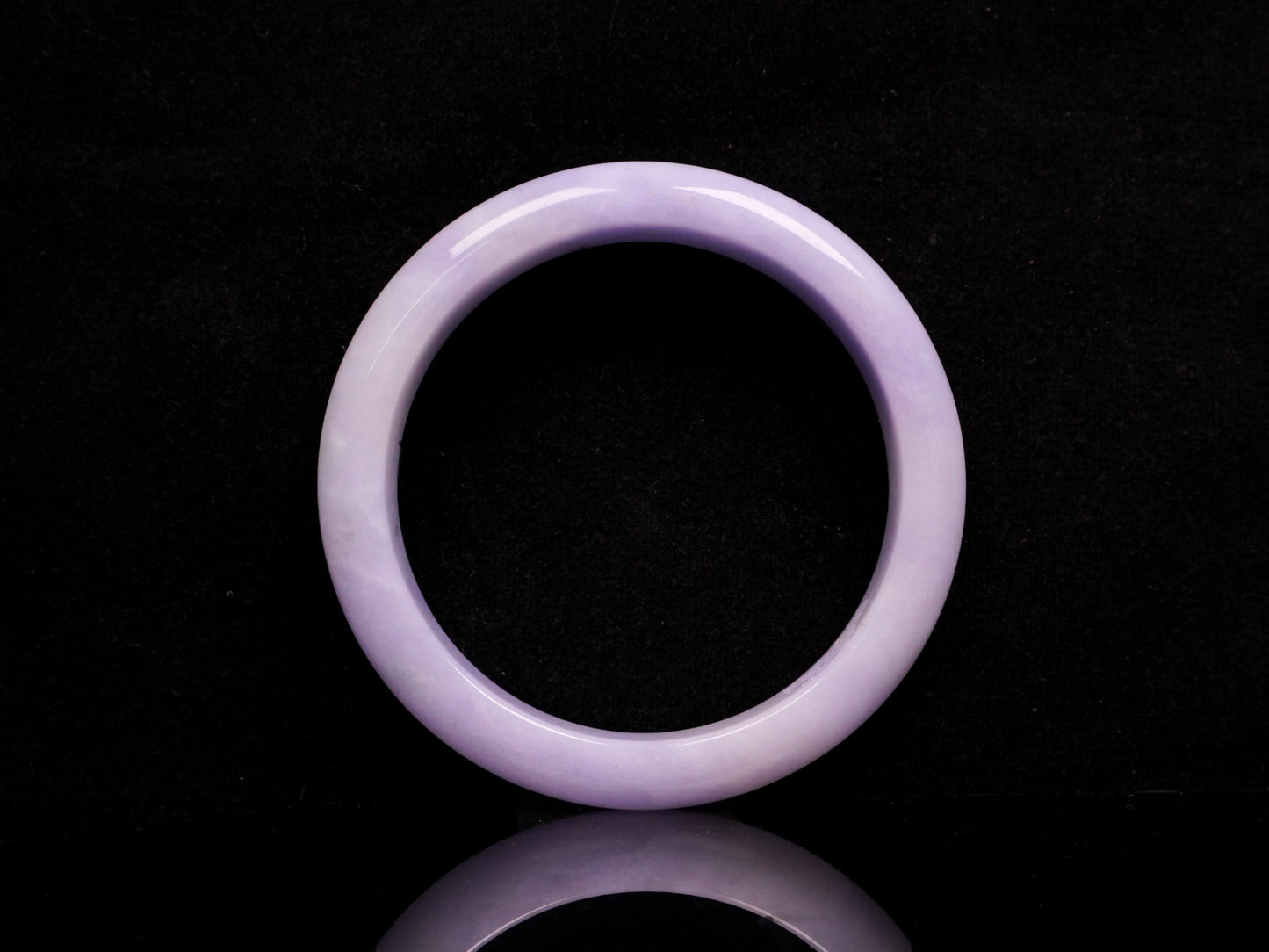 Lavender hues spreading jadeite bangle.