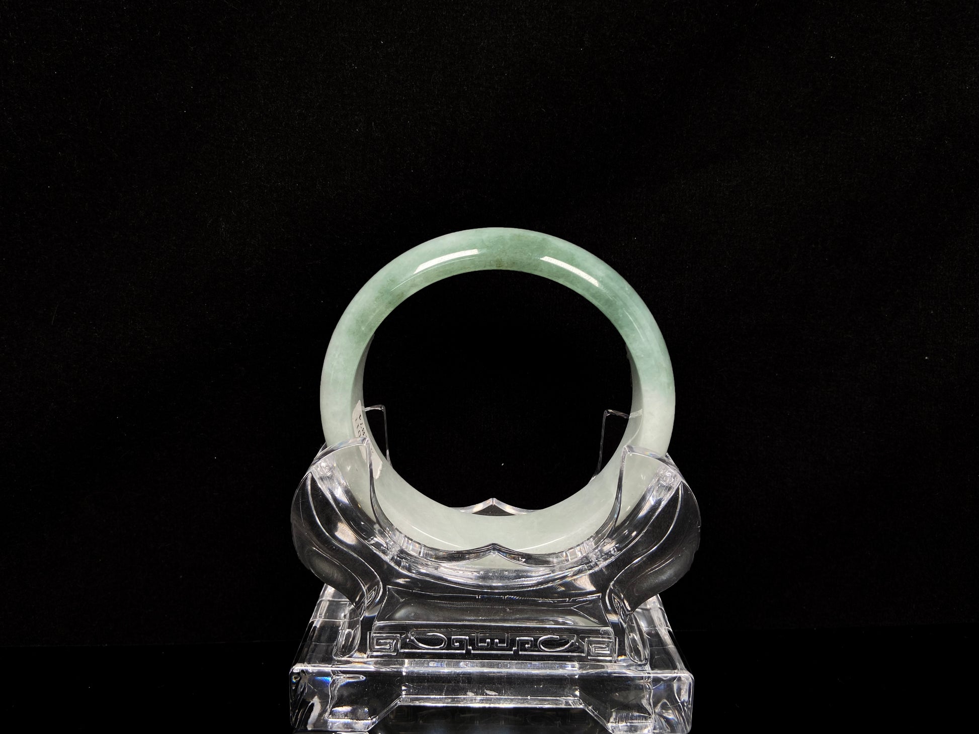 A fresh green with cloud white jadeite bangle.