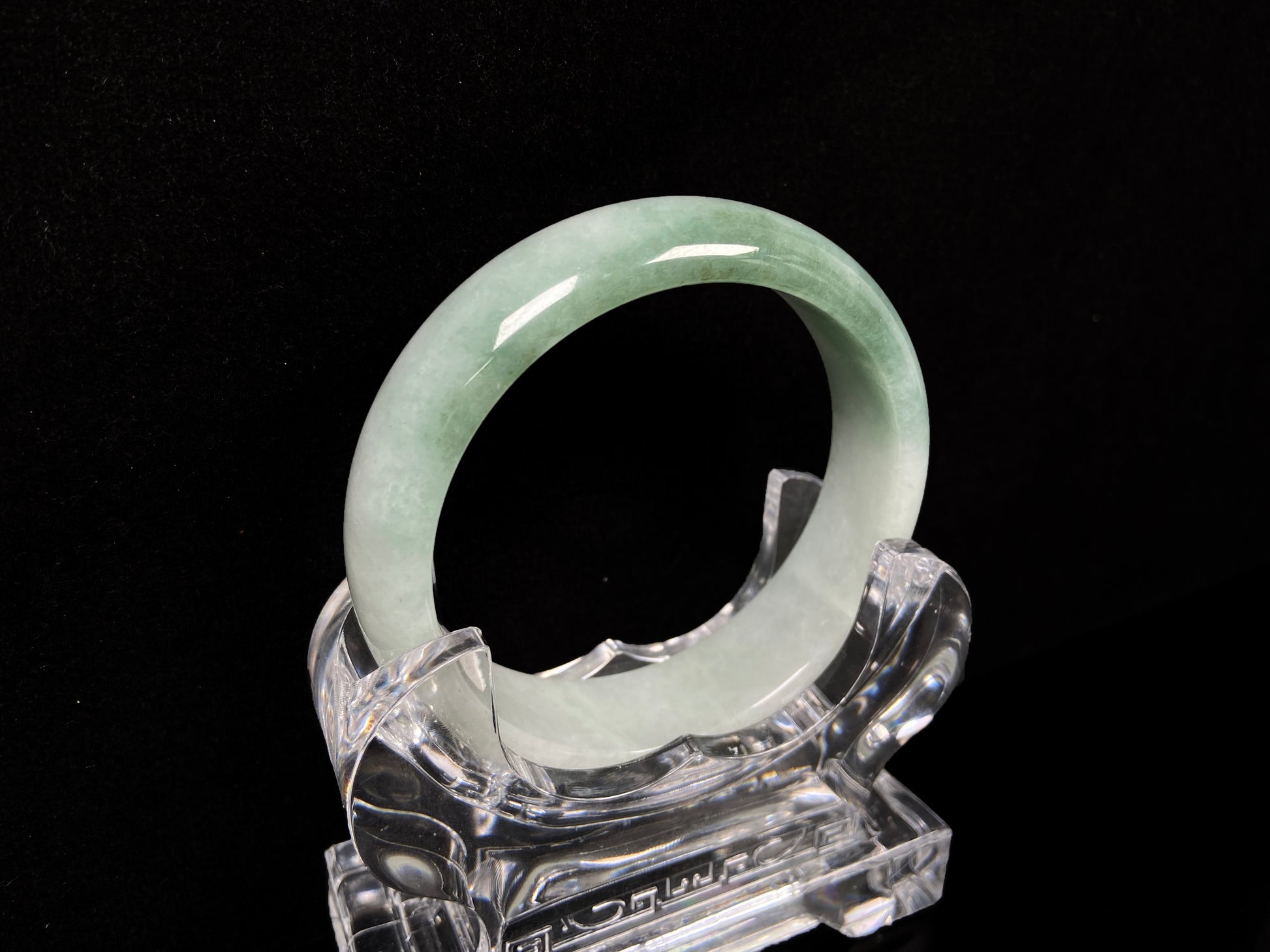 A fresh green with cloud white jadeite bangle.