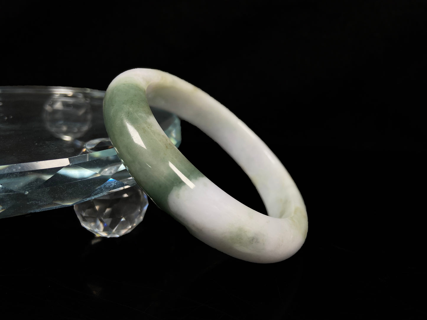 A creamy white green  jadeite bangle.