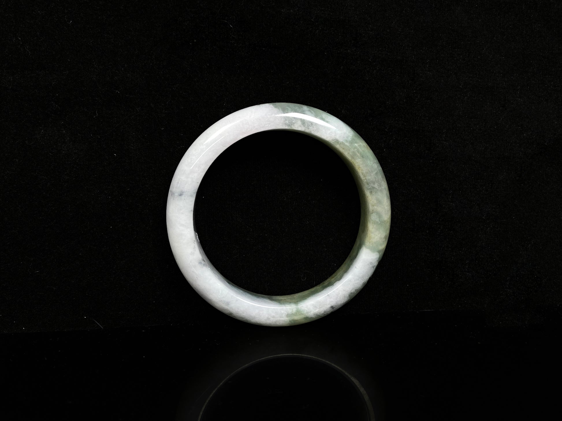 A snowy bamboo streaming lightly  jadeite bangle.