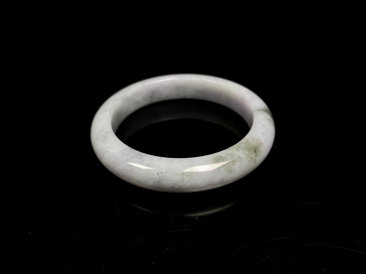 A mossy cloud hush jadeite bangle.