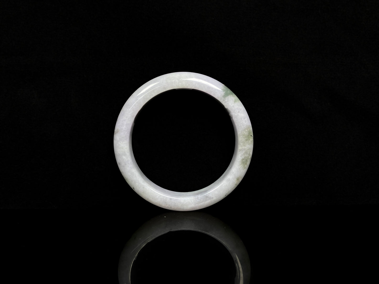 A mossy cloud hush jadeite bangle.