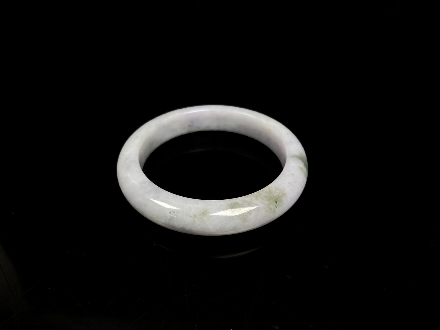 A mossy cloud hush jadeite bangle.