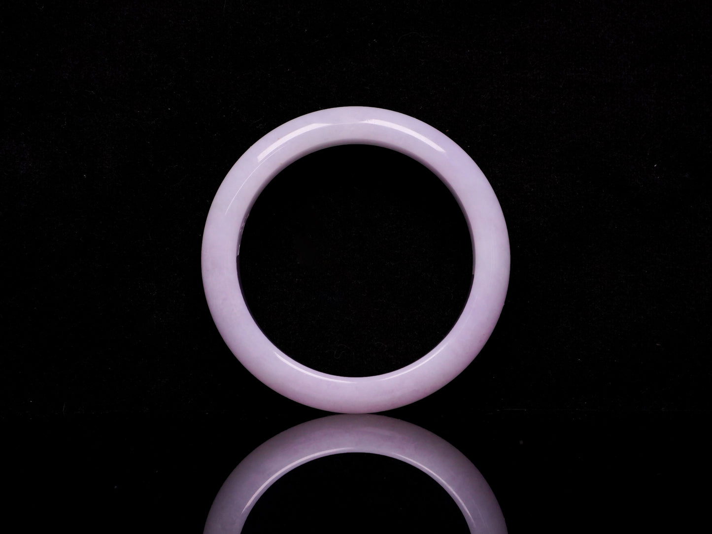 Lavender hues spreading jadeite bangle.