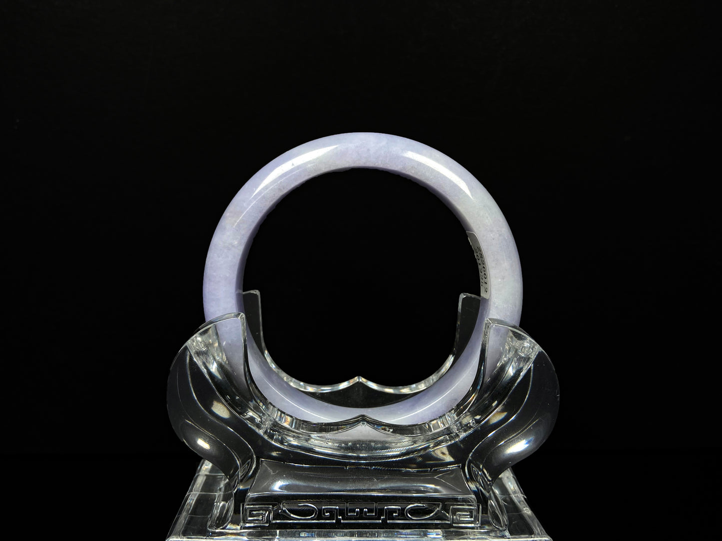 A lavender with cloud white  jadeite bangle.