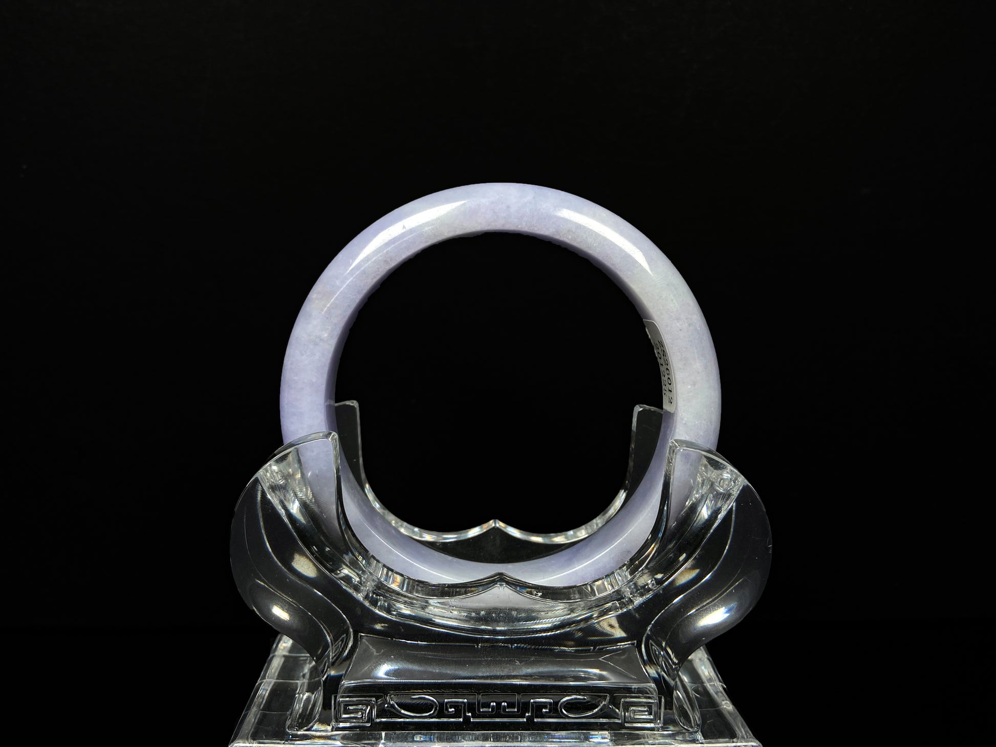 A lavender with cloud white  jadeite bangle.