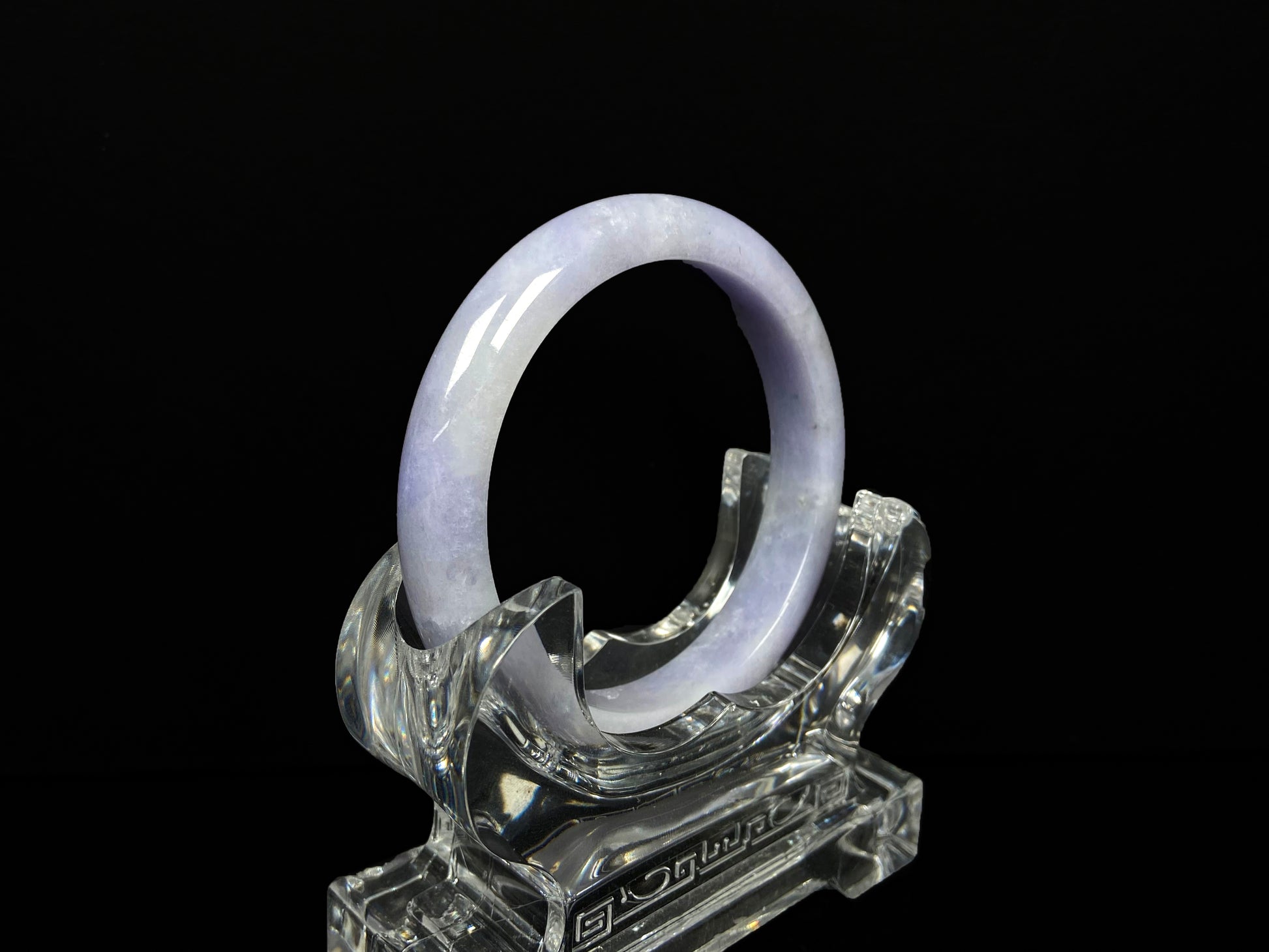 A lavender with cloud white  jadeite bangle.