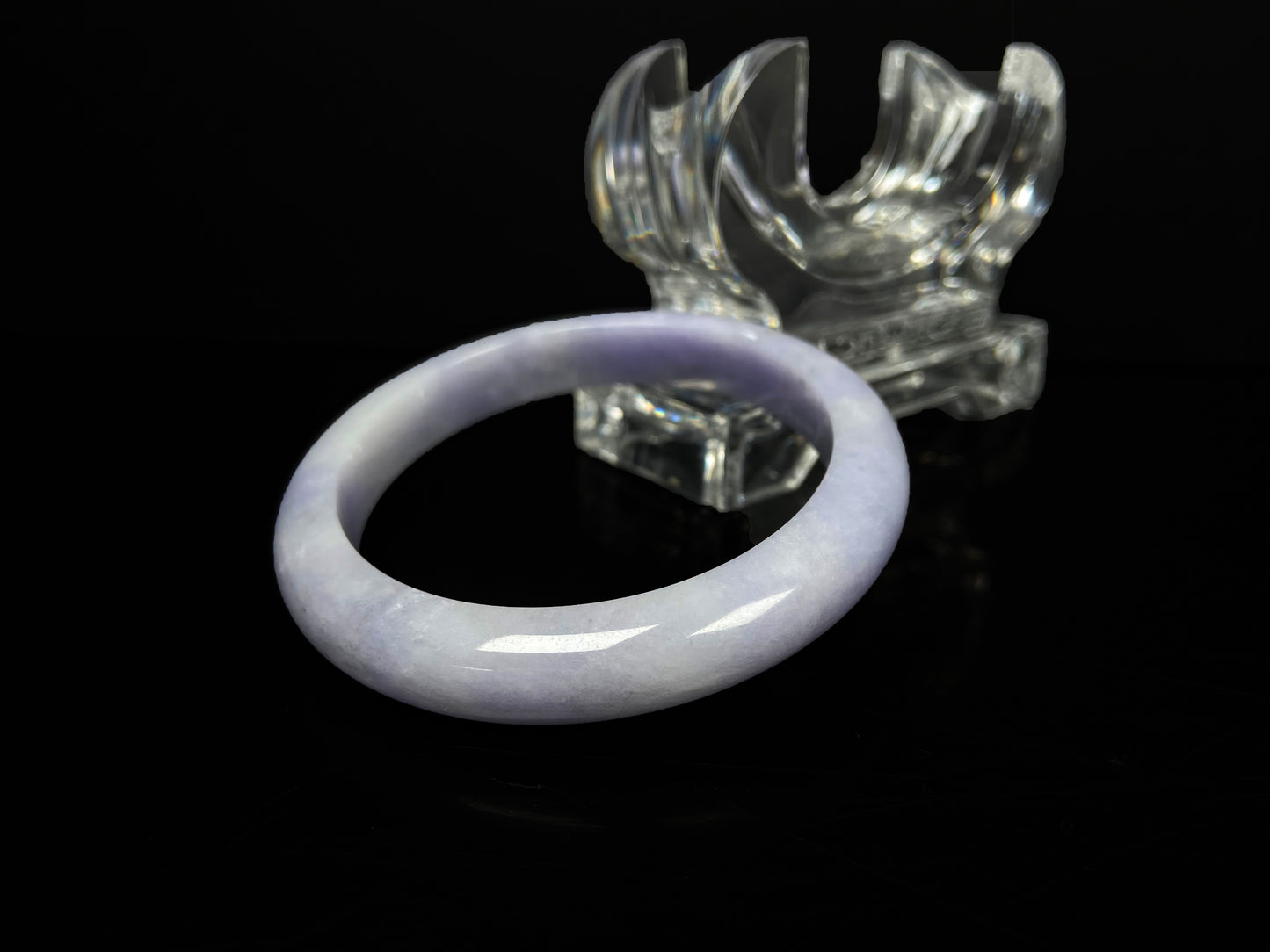 A lavender with cloud white  jadeite bangle.