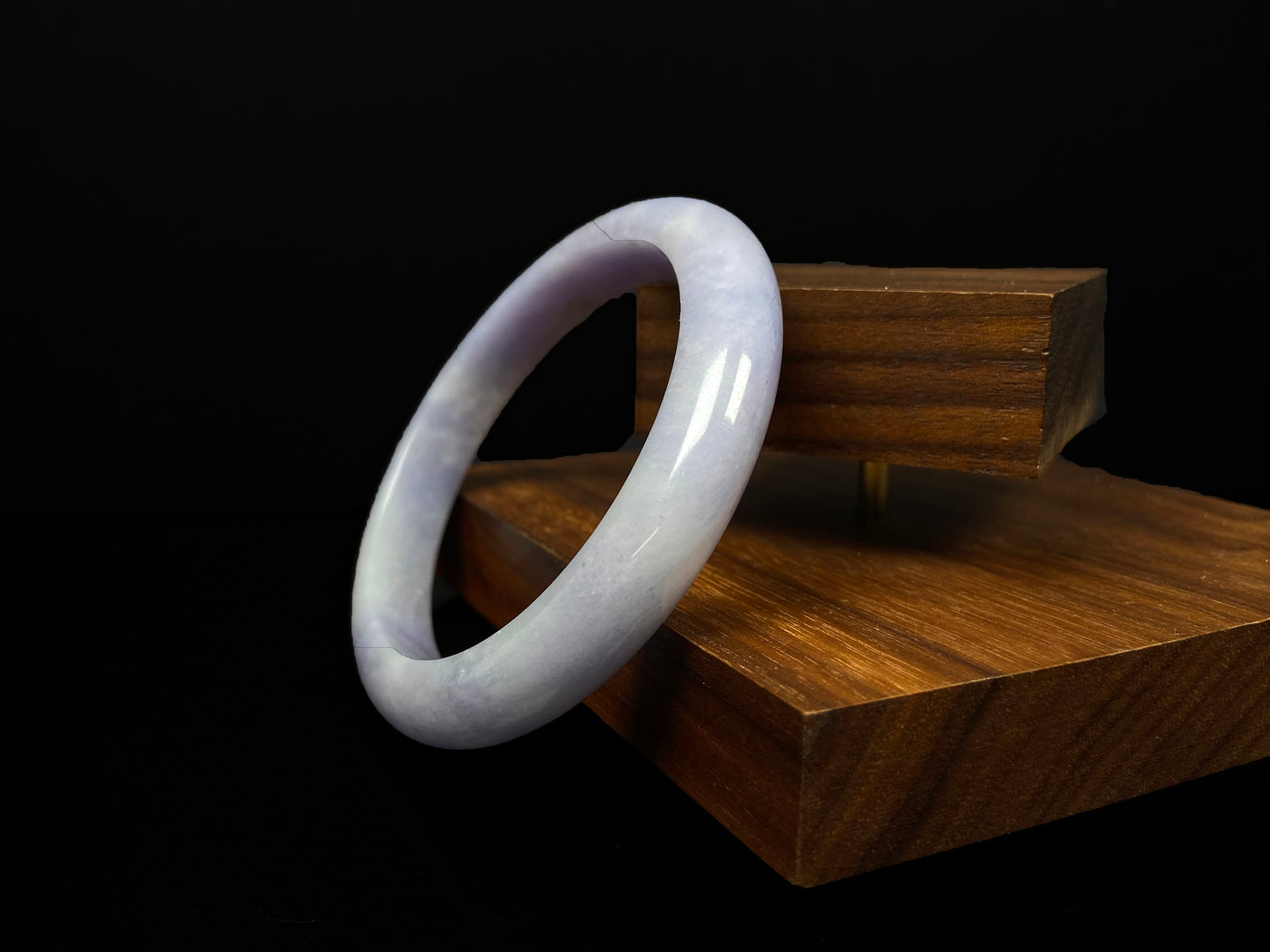 A lavender with cloud white  jadeite bangle.
