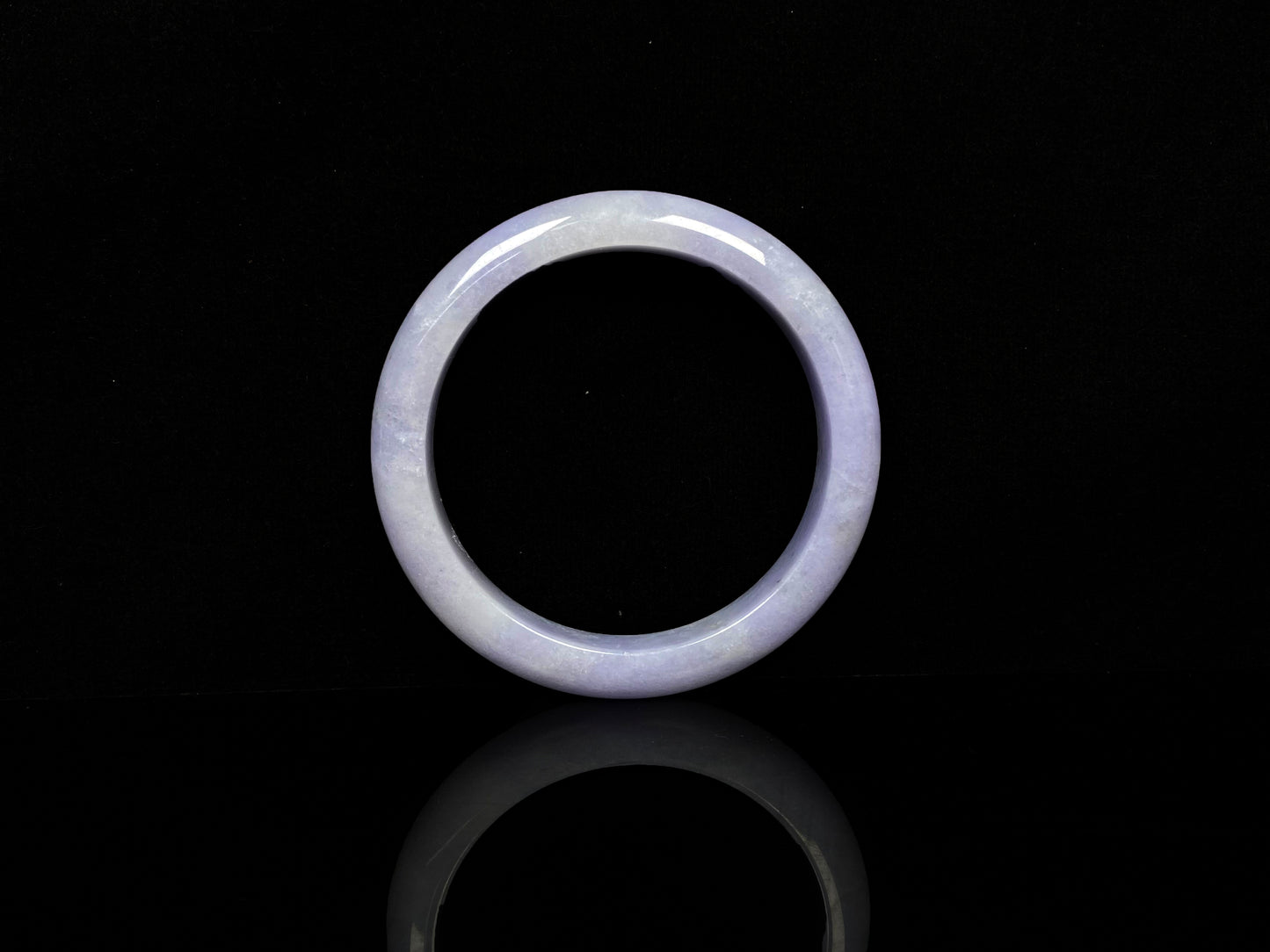 A lavender with cloud white  jadeite bangle.