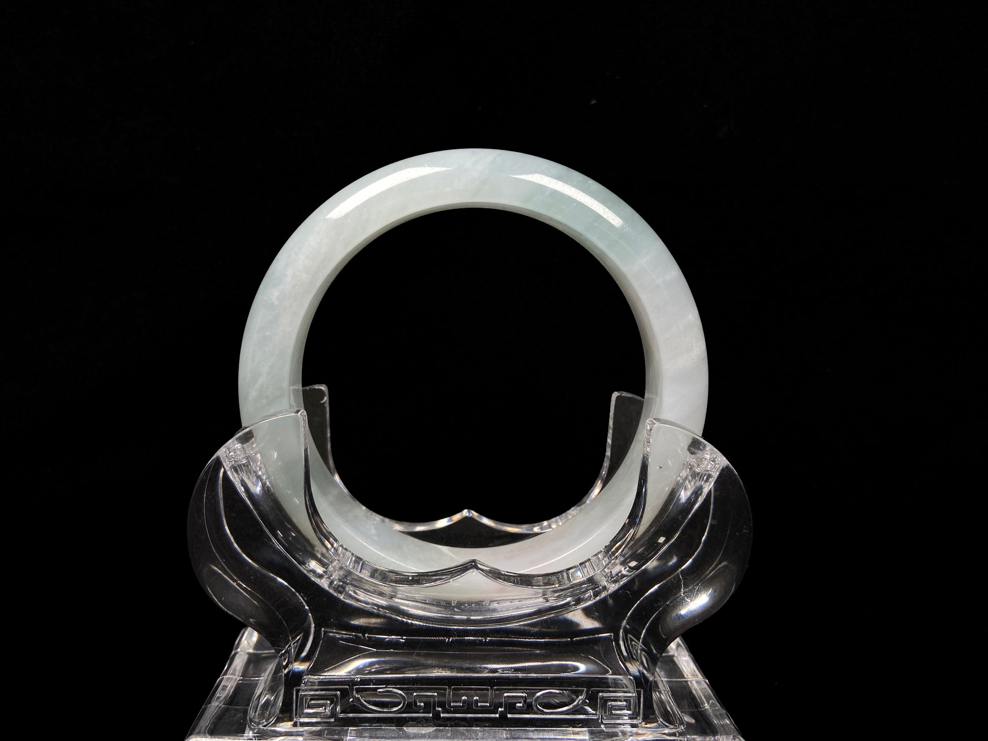 A pale azure cloud white jadeite bangle.