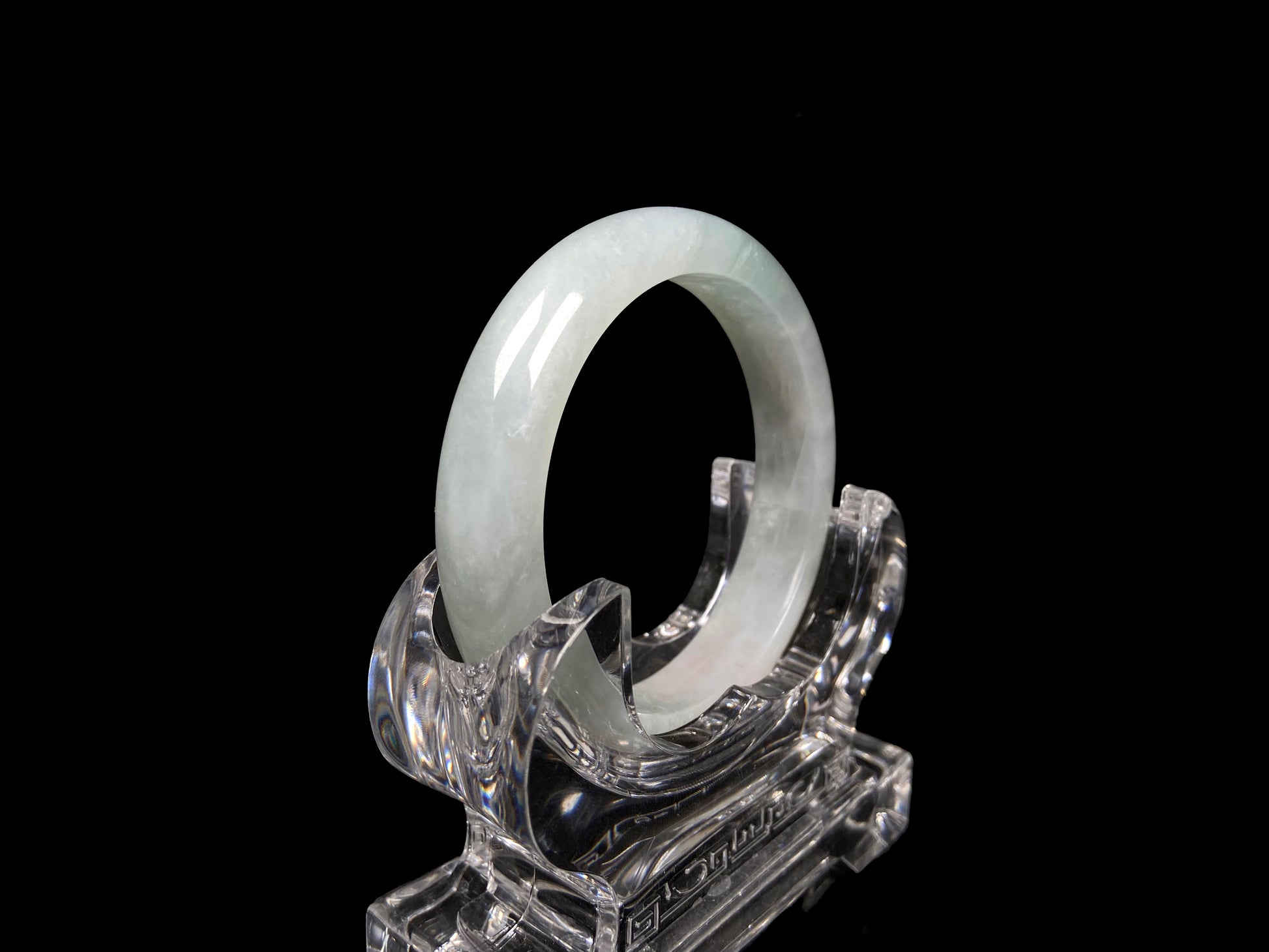 A pale azure cloud white jadeite bangle.
