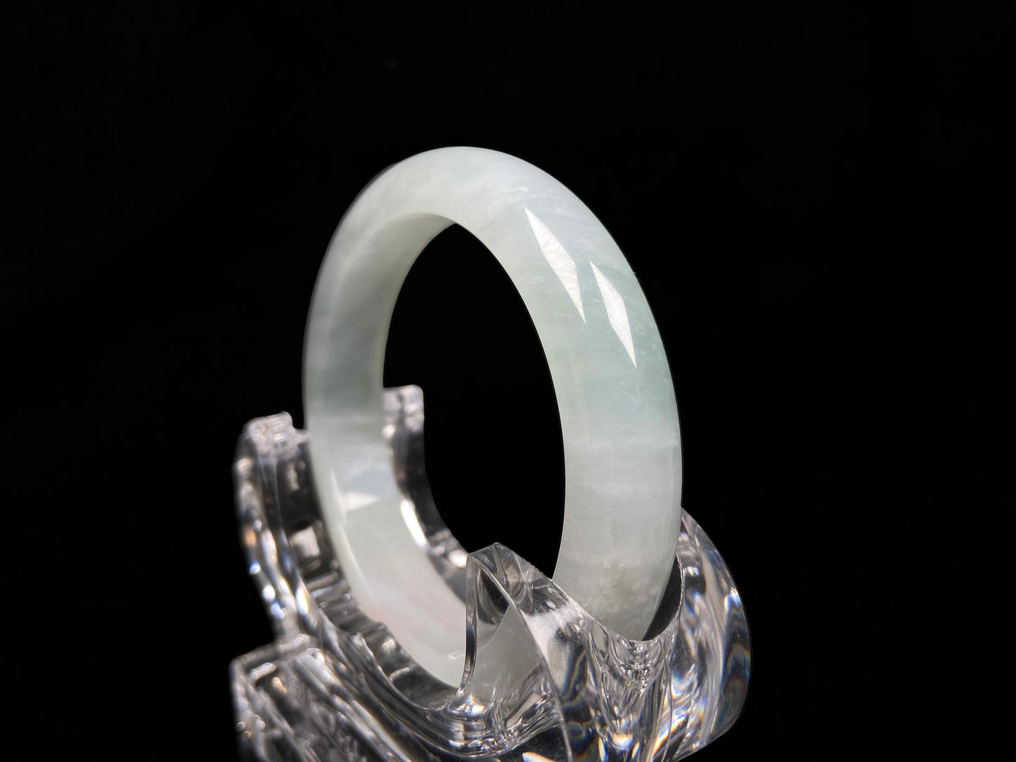 A pale azure cloud white jadeite bangle.