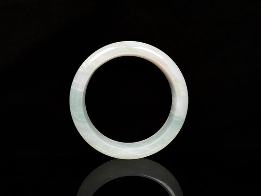 A pale azure cloud white jadeite bangle.