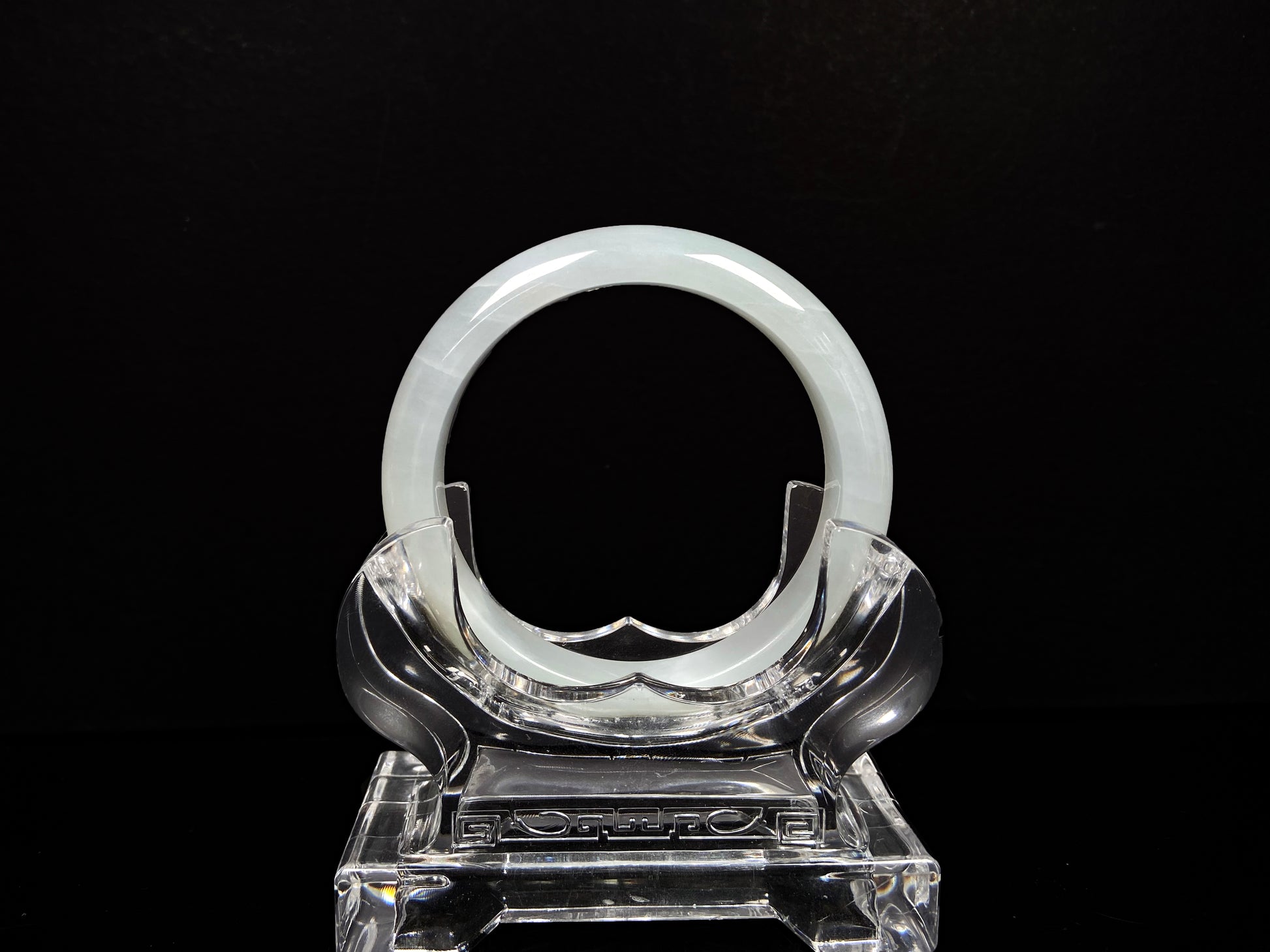 A pure milky white jadeite bangle.