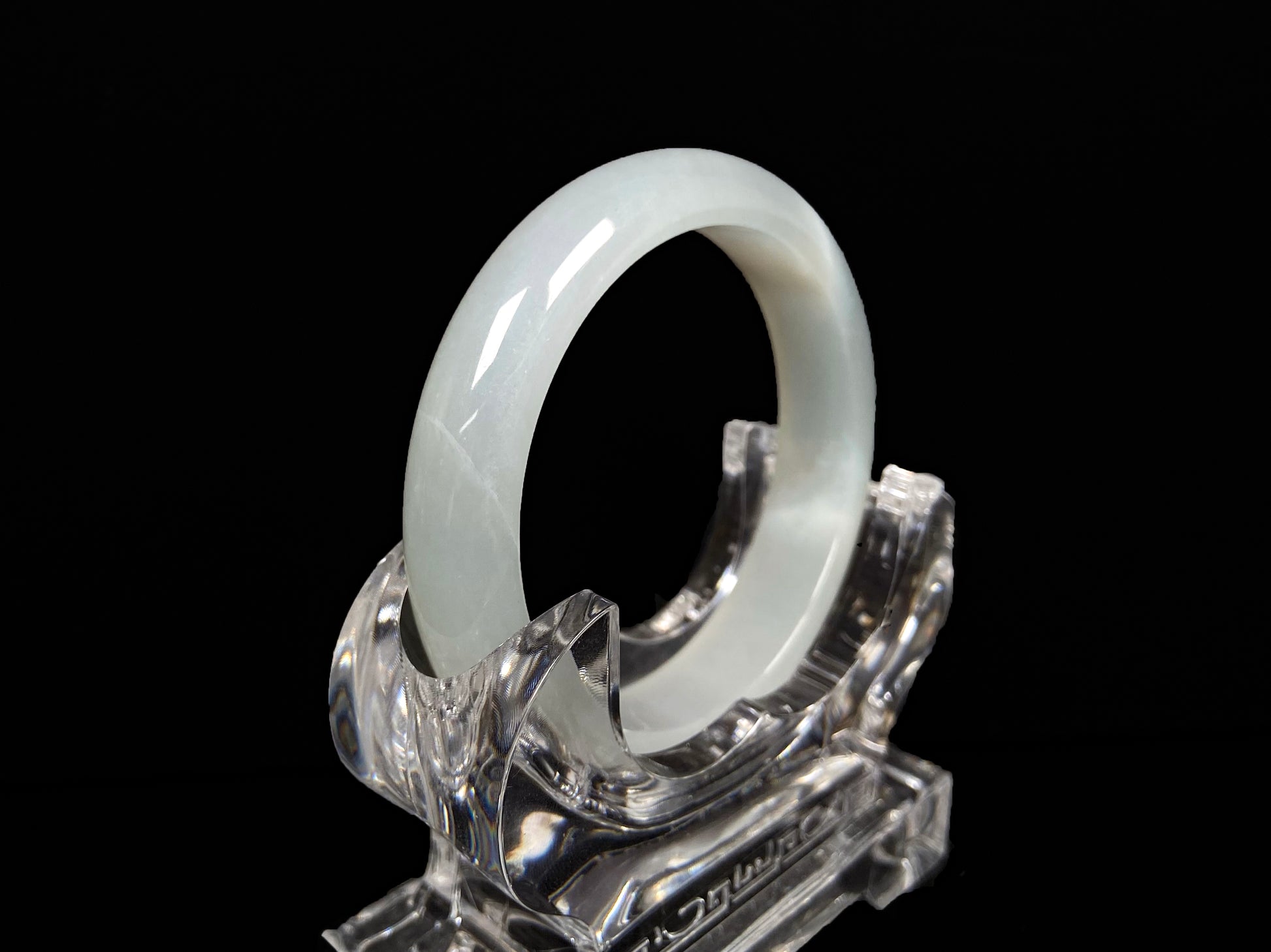 A pure milky white jadeite bangle.