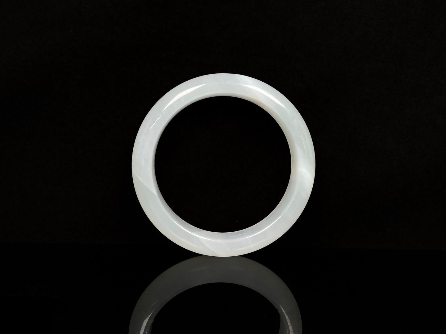 A pure milky white jadeite bangle.