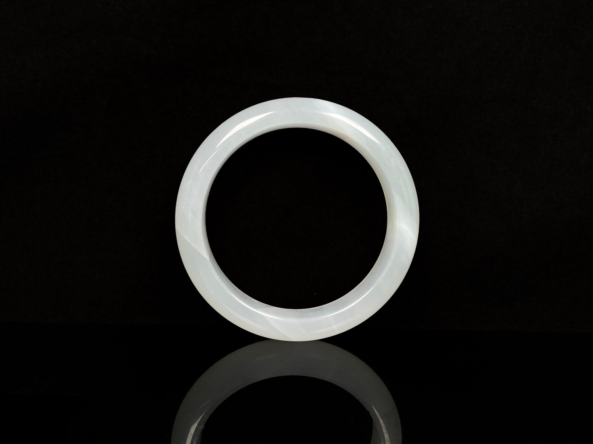 A pure milky white jadeite bangle.